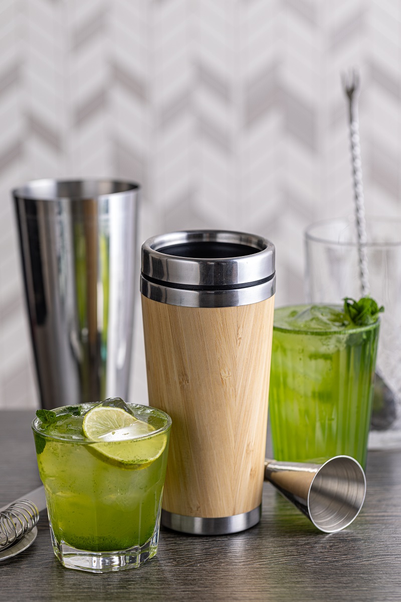 Green cocktail with vermouth, mint and citrus. Summer drink concept